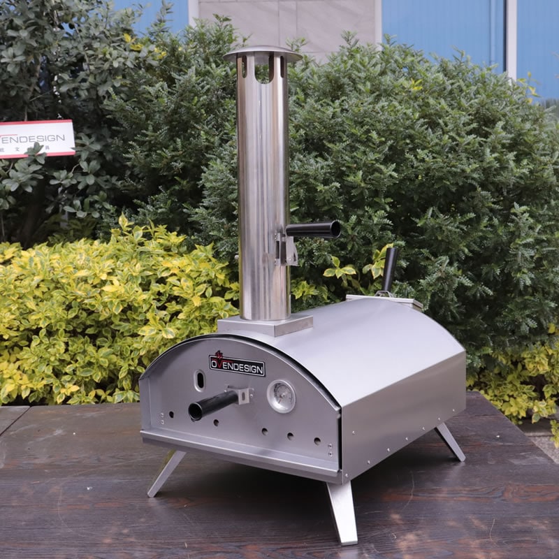 Portable wood-fired pizza oven with pull-out drawer